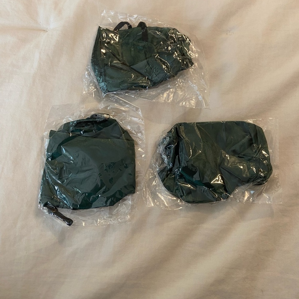 Three Satin Emerald Green Face Masks. New, never opened.